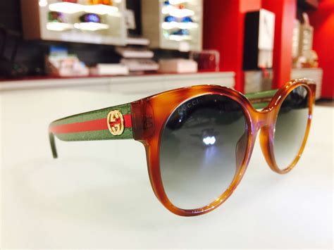 kering eyewear gucci sign in.